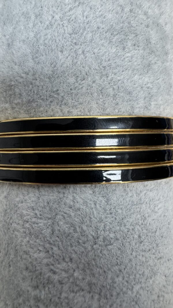 PULSERA NEGRA DORADA